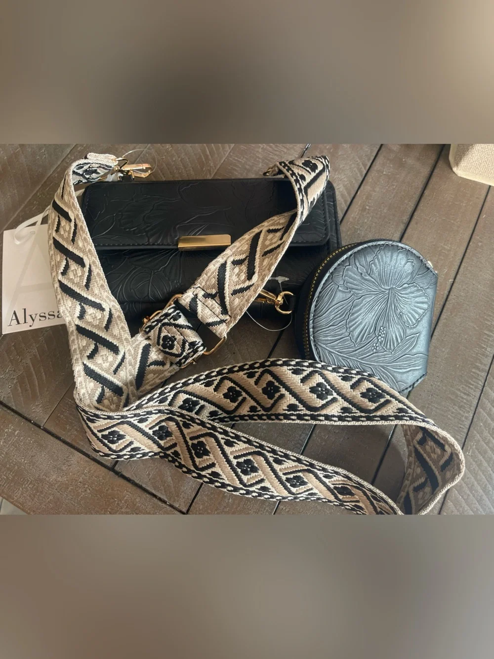Black Embossed Crossbody Wallet with Patterned Strap and Coin Pouch